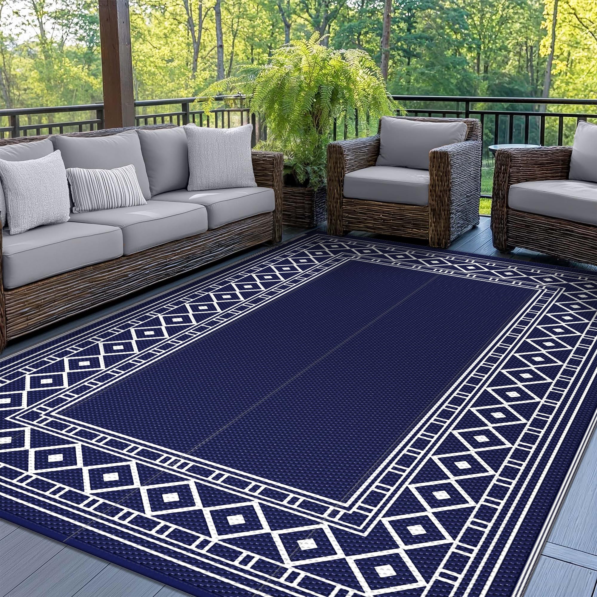 GENIMO 6'x9' outdoor rug in navy blue and white geometric design