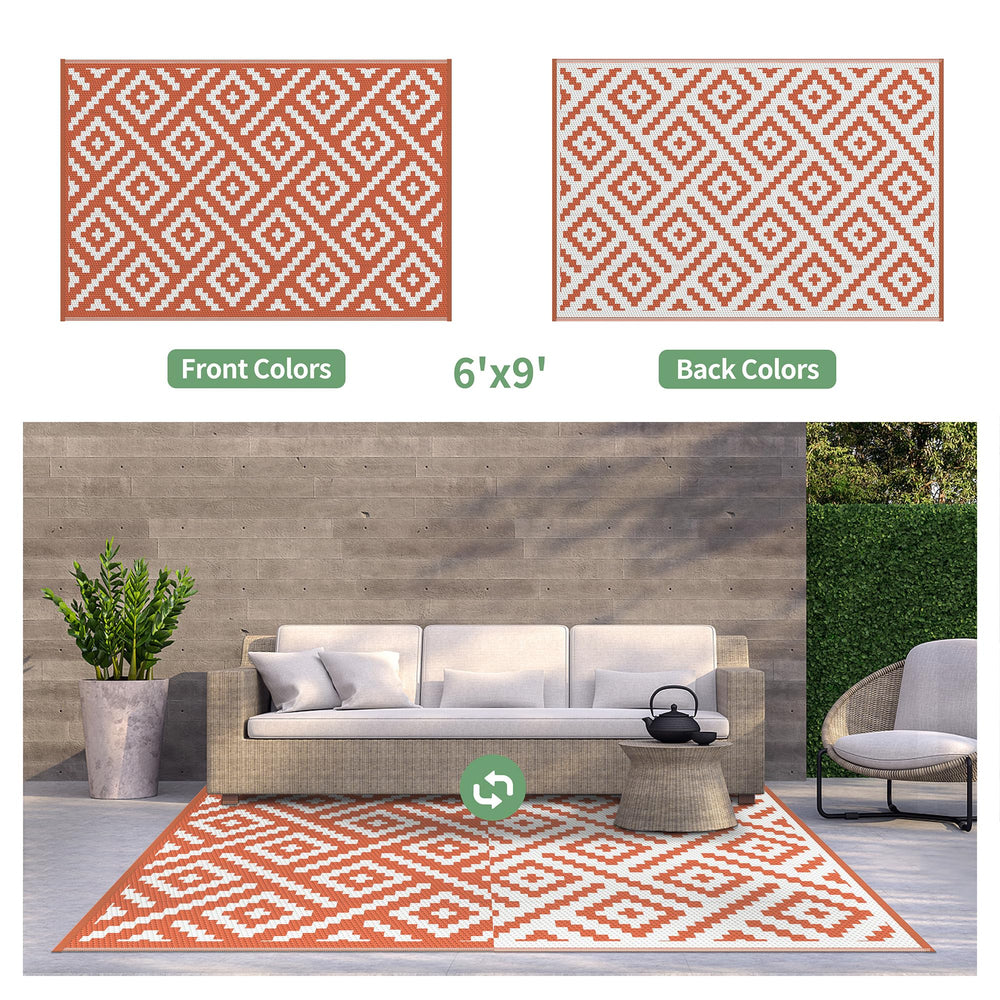 GENIMO 6'x9' Outdoor Rug laid on a patio with furniture