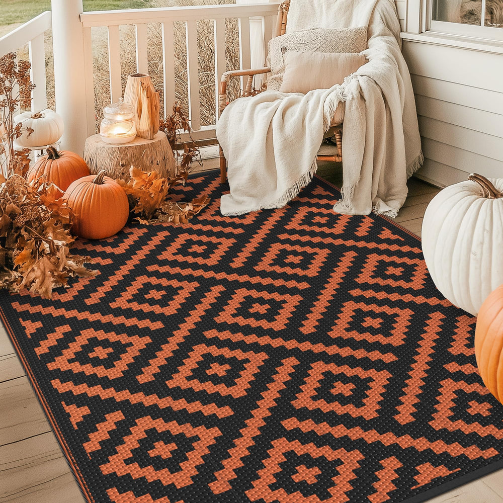 GENIMO Outdoor Rug 6'x9' Black Orange reversible pattern