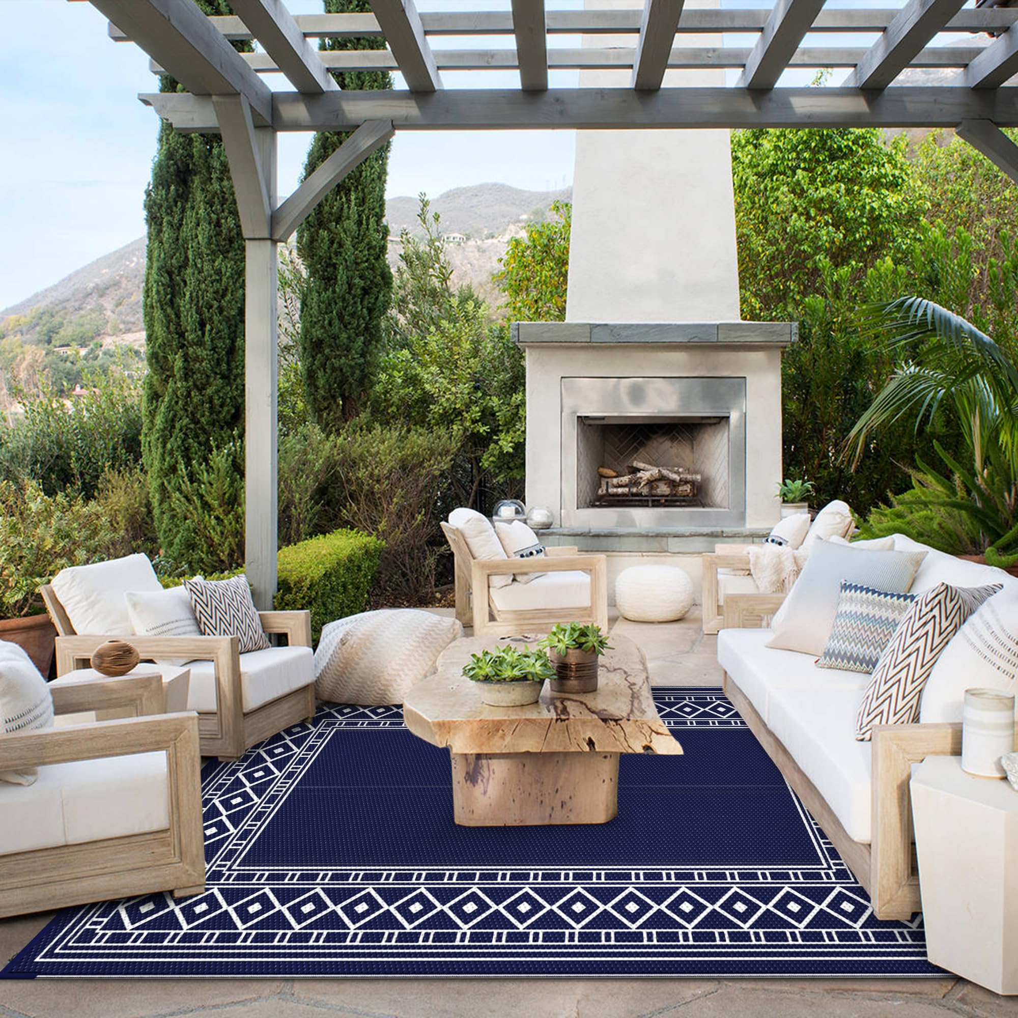 GENIMO outdoor rug displayed on a patio with furniture