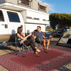 GENIMO Outdoor Rug displayed on a patio with furniture