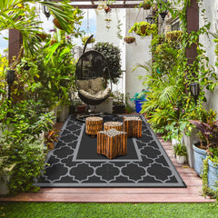 GENIMO Outdoor Rug placed on patio furniture