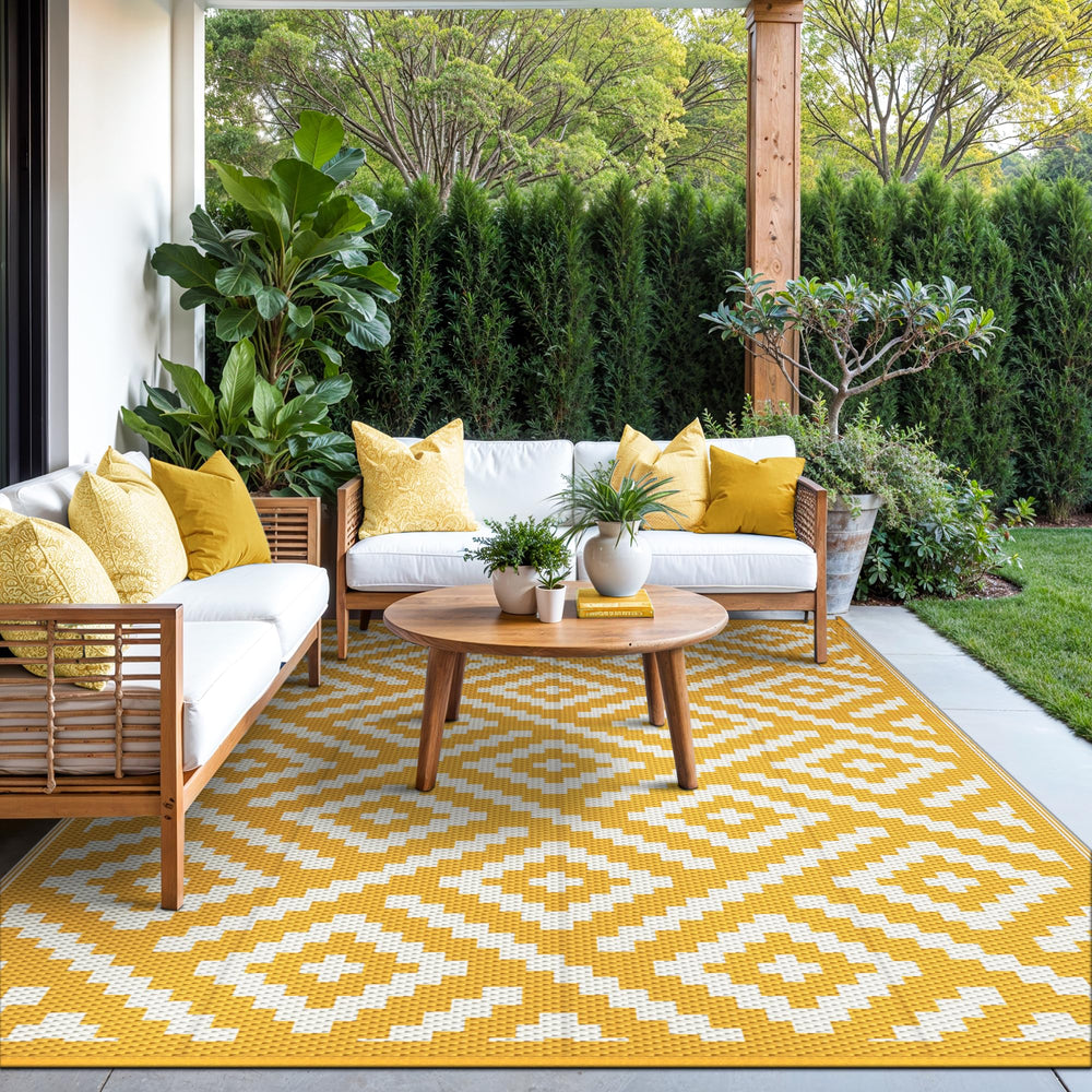 GENIMO outdoor rug showing reversible design with geometric patterns