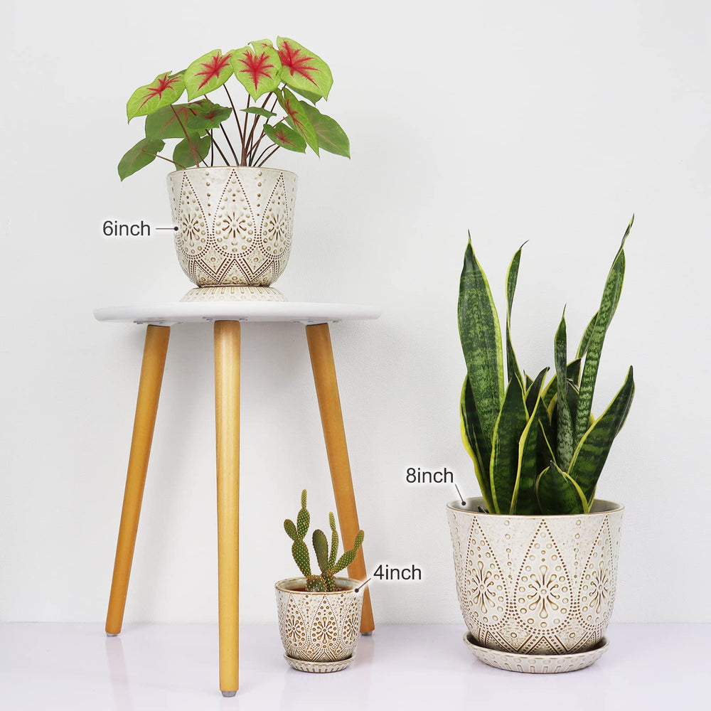 Gepege 8 Inch White Ceramic Plant Pot close-up of drainage holes