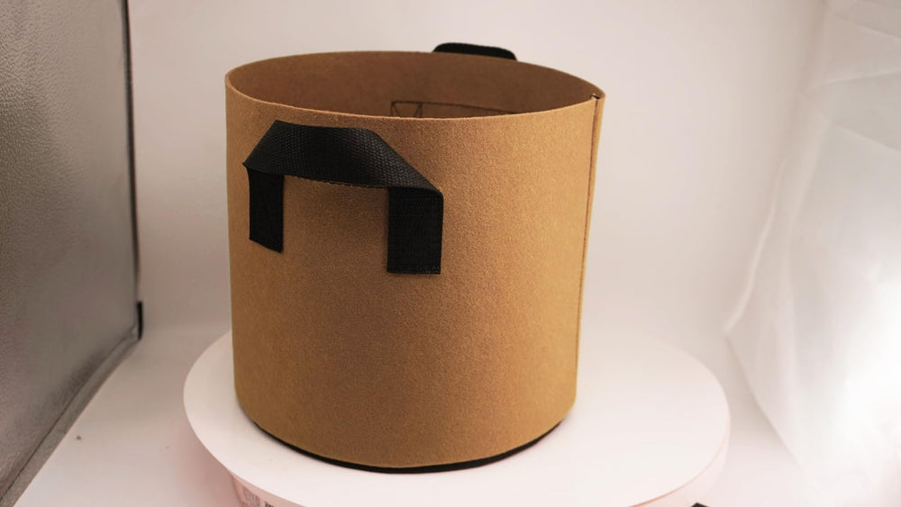 Germinator 6 grow bag in a garden setting with plants