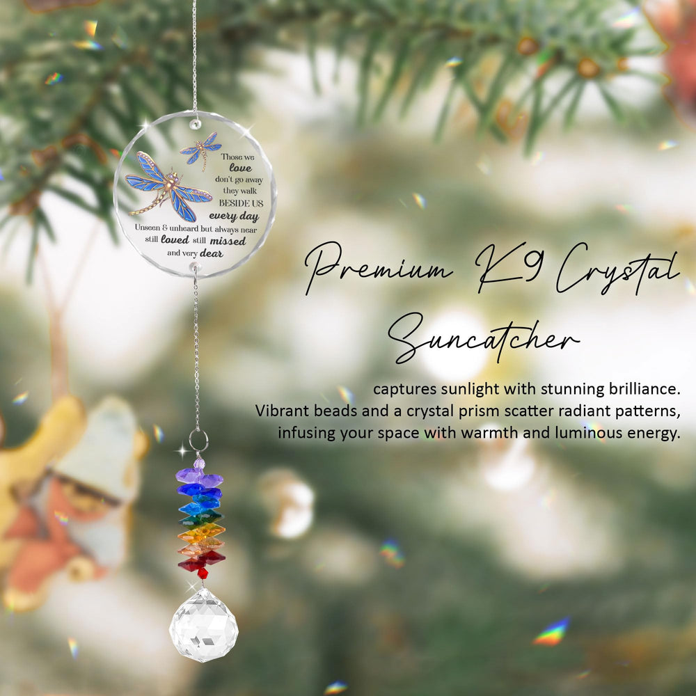 GIFTELIX suncatcher hanging in a window reflecting sunlight