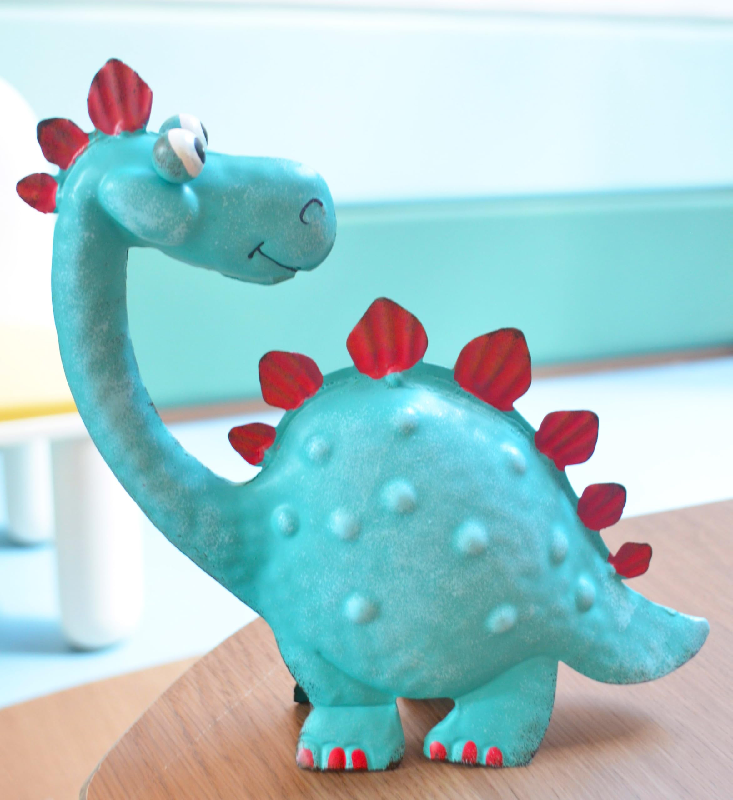 GIFTME 5 Dinosaur Garden Statue placed among flowers
