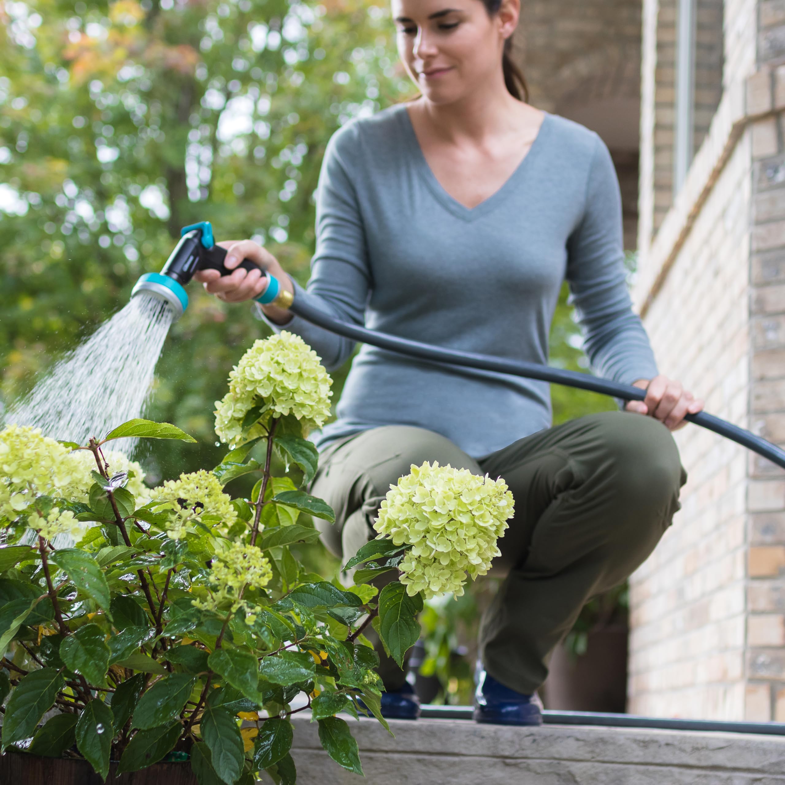 GILMOUR Flexogen hose with attached sprinkler in use
