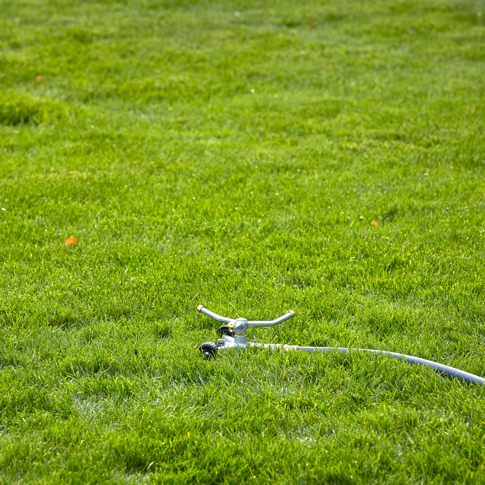 GILMOUR Sprinkler attached to a standard garden hose