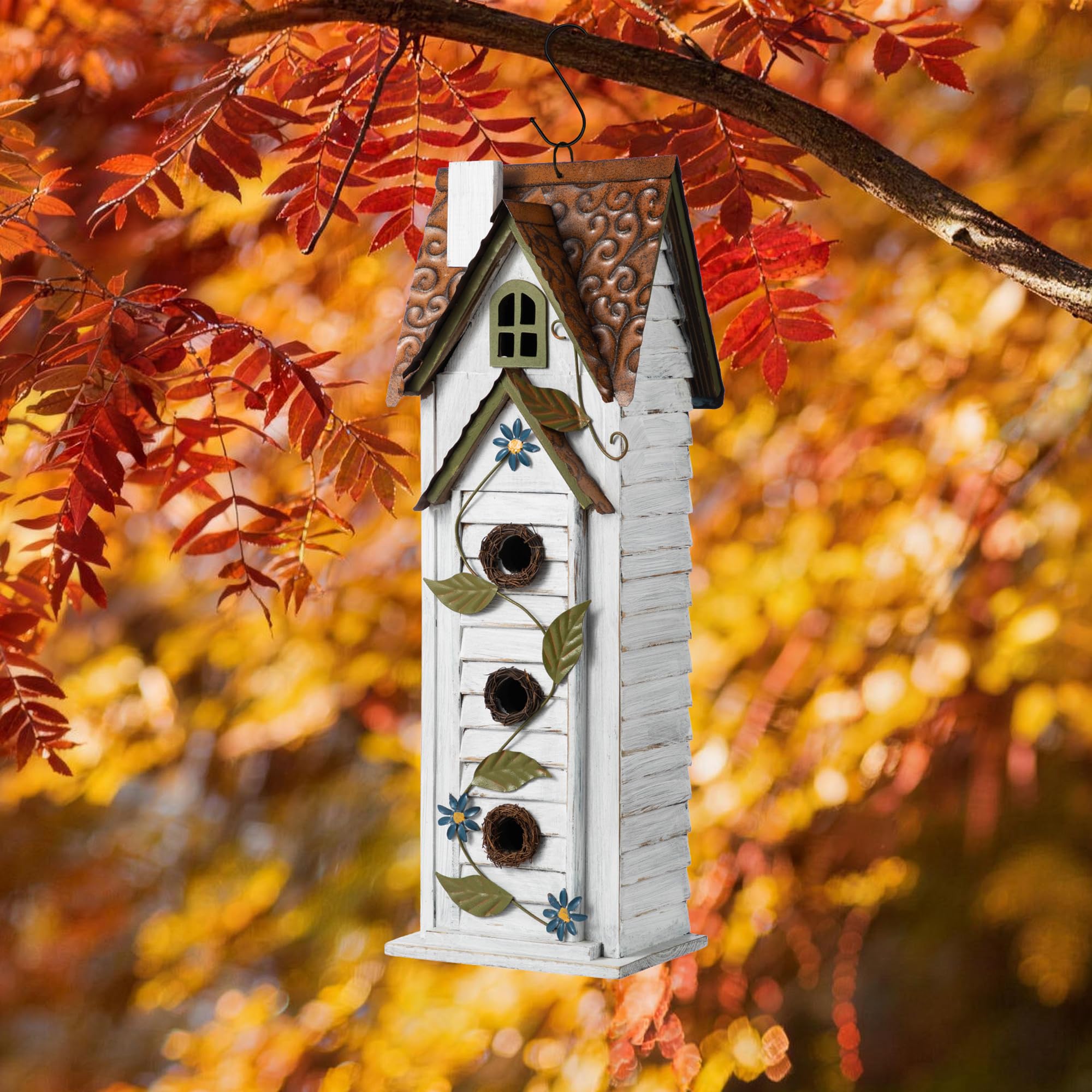 Glitzhome bird house hanging in a garden setting