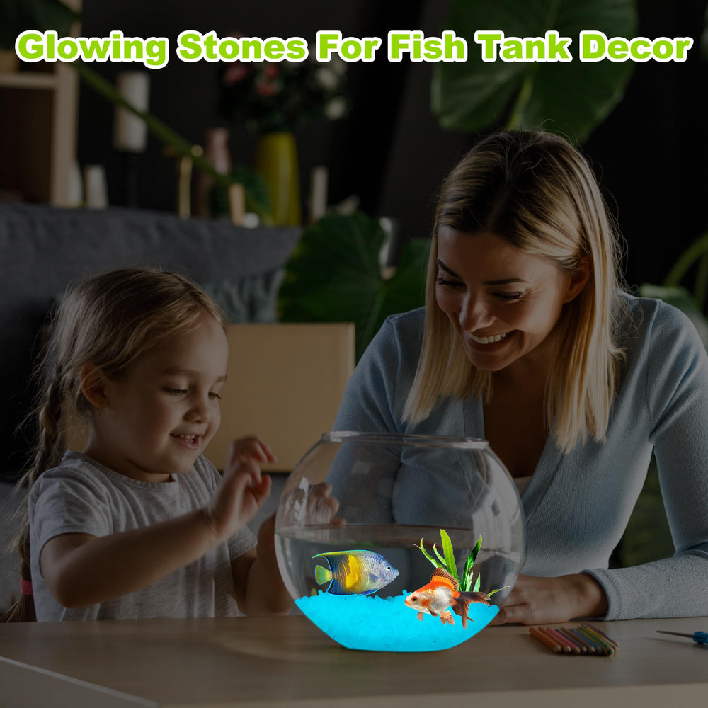 Glow in the dark pebbles scattered in a fish tank