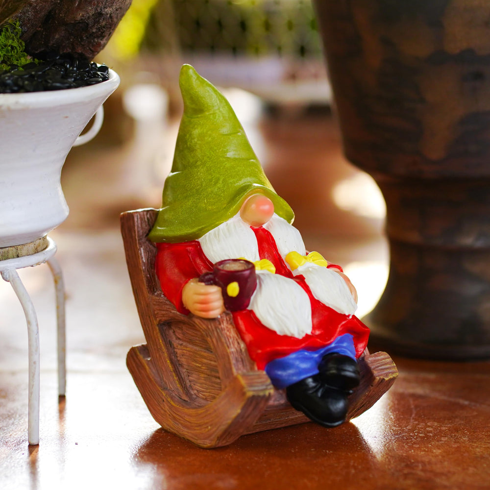 Gnome statue on a patio table with flowers