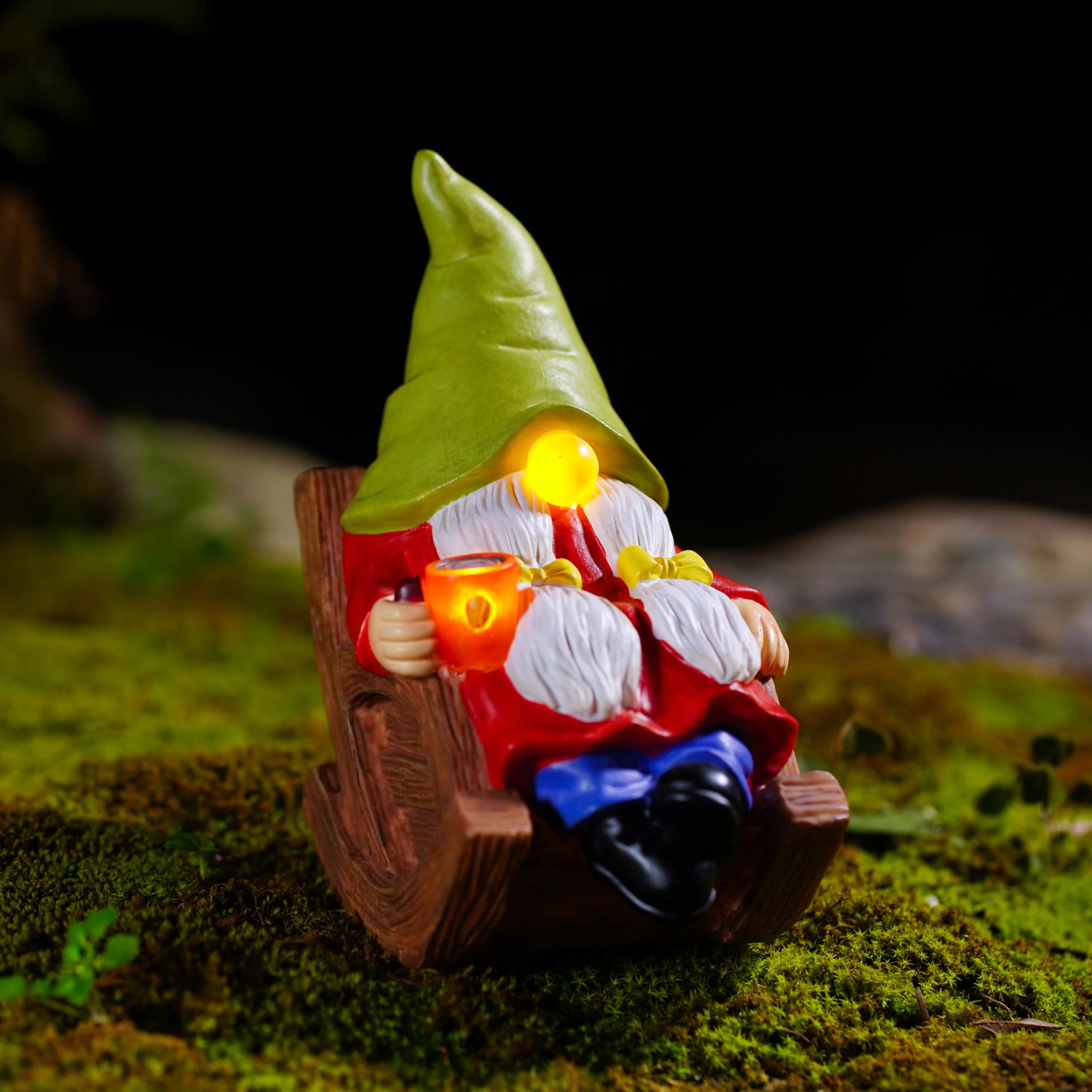 Gnome statue placed in a garden setting during the day