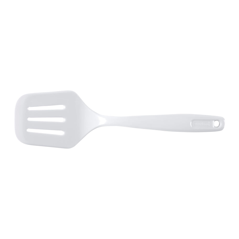 GoodCook slotted turner in use, transferring grilled food from barbecue
