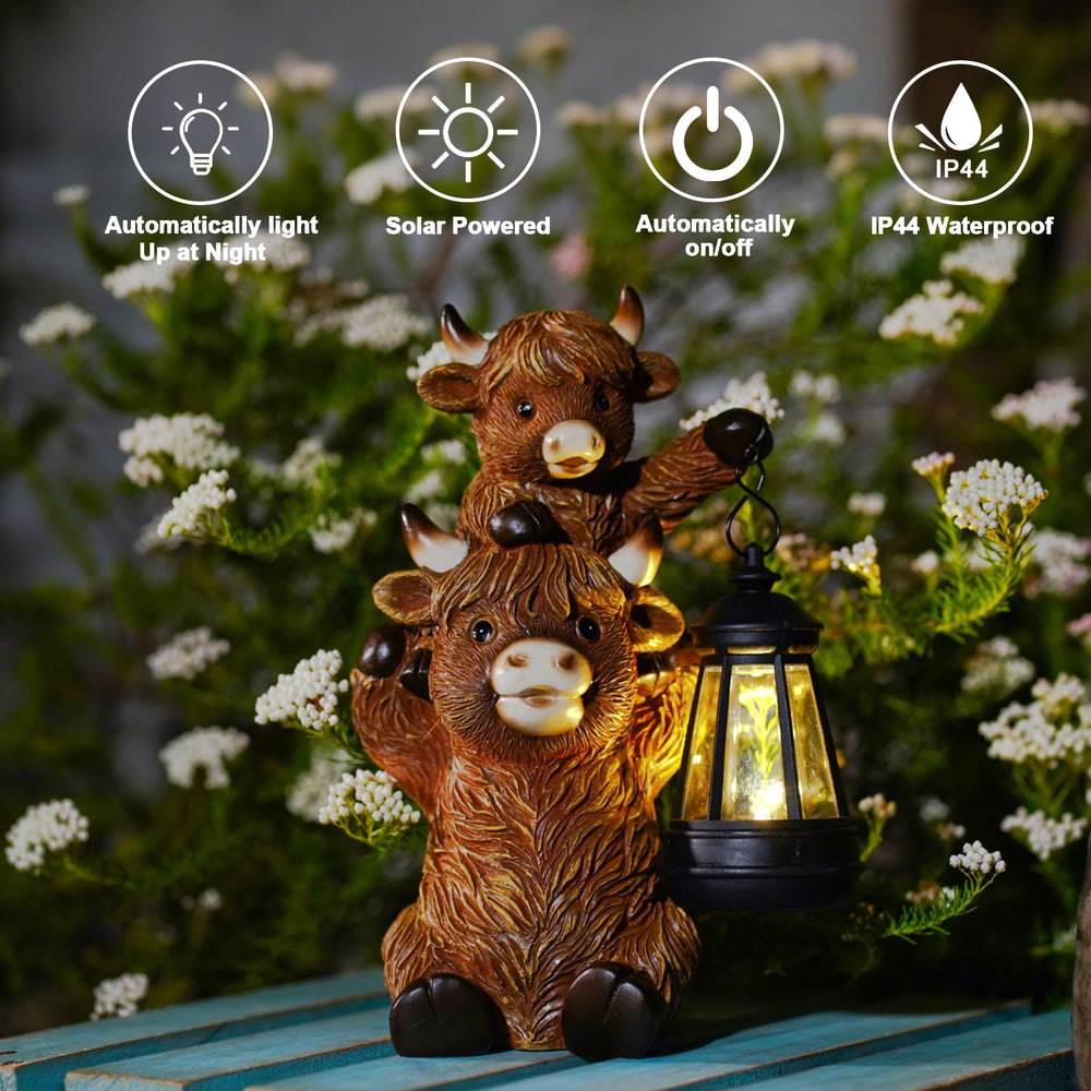 Goodeco Highland Cow Garden Statue with flowers around it
