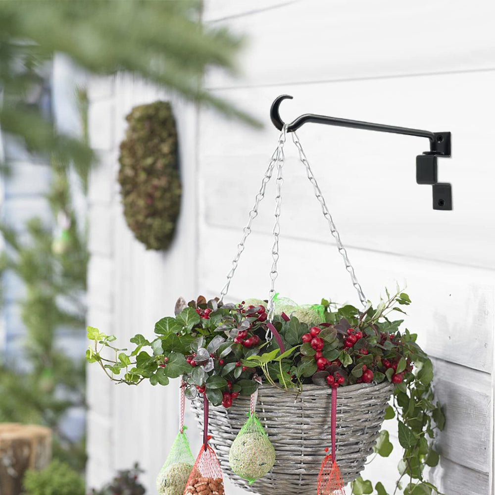 Greemov plant hanger displaying a flower pot outdoors