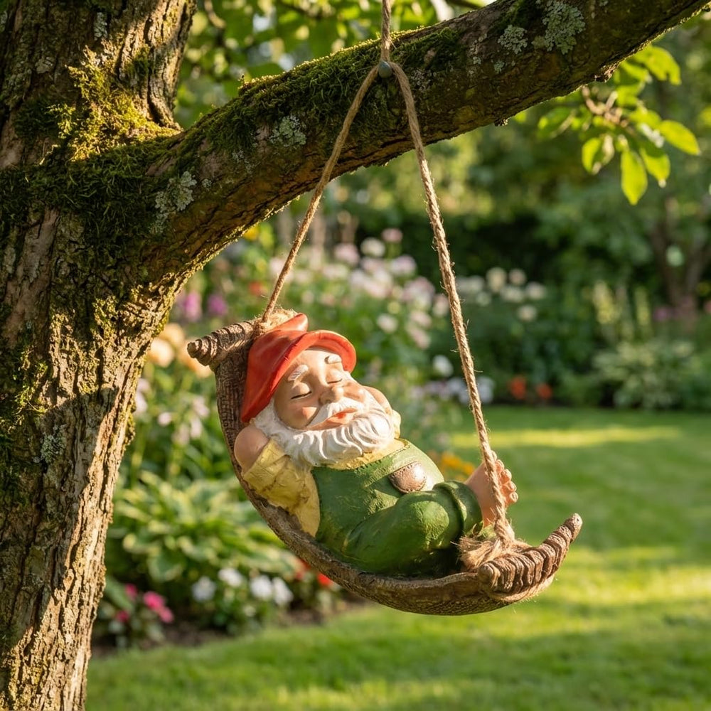 Green Gnome Statue hanging from tree branch