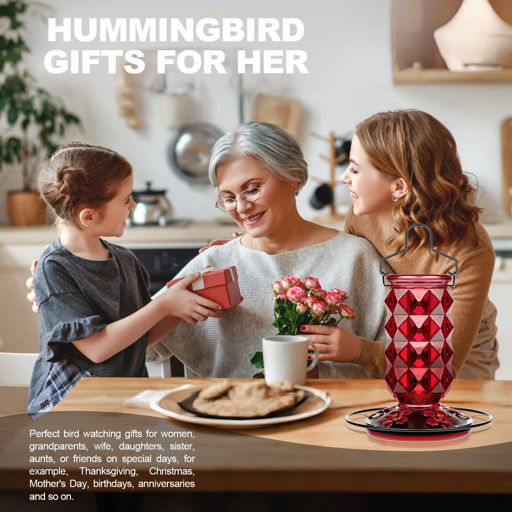 Grete Gotye hummingbird feeder in a vibrant garden setting