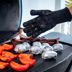 Grill Armor Gloves being used to handle hot grill