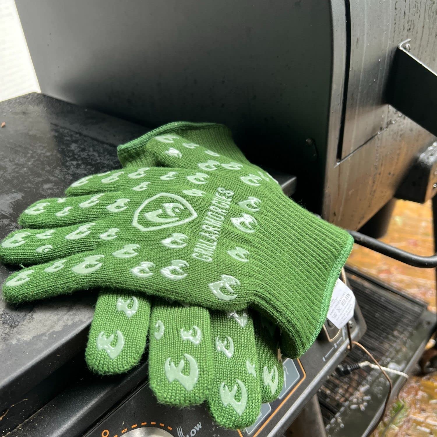 Grill Armor Gloves with a BBQ grill in the background