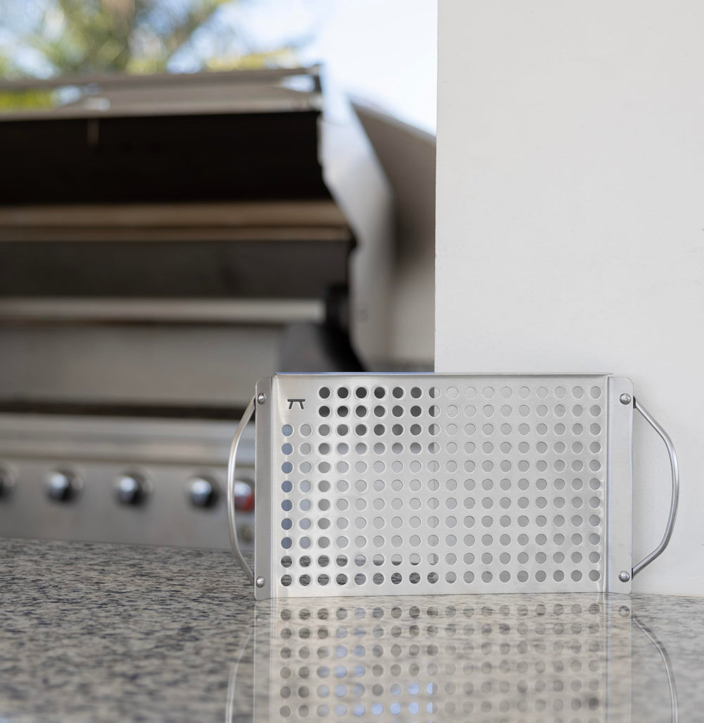 Grill Topper on a barbecue grill with food