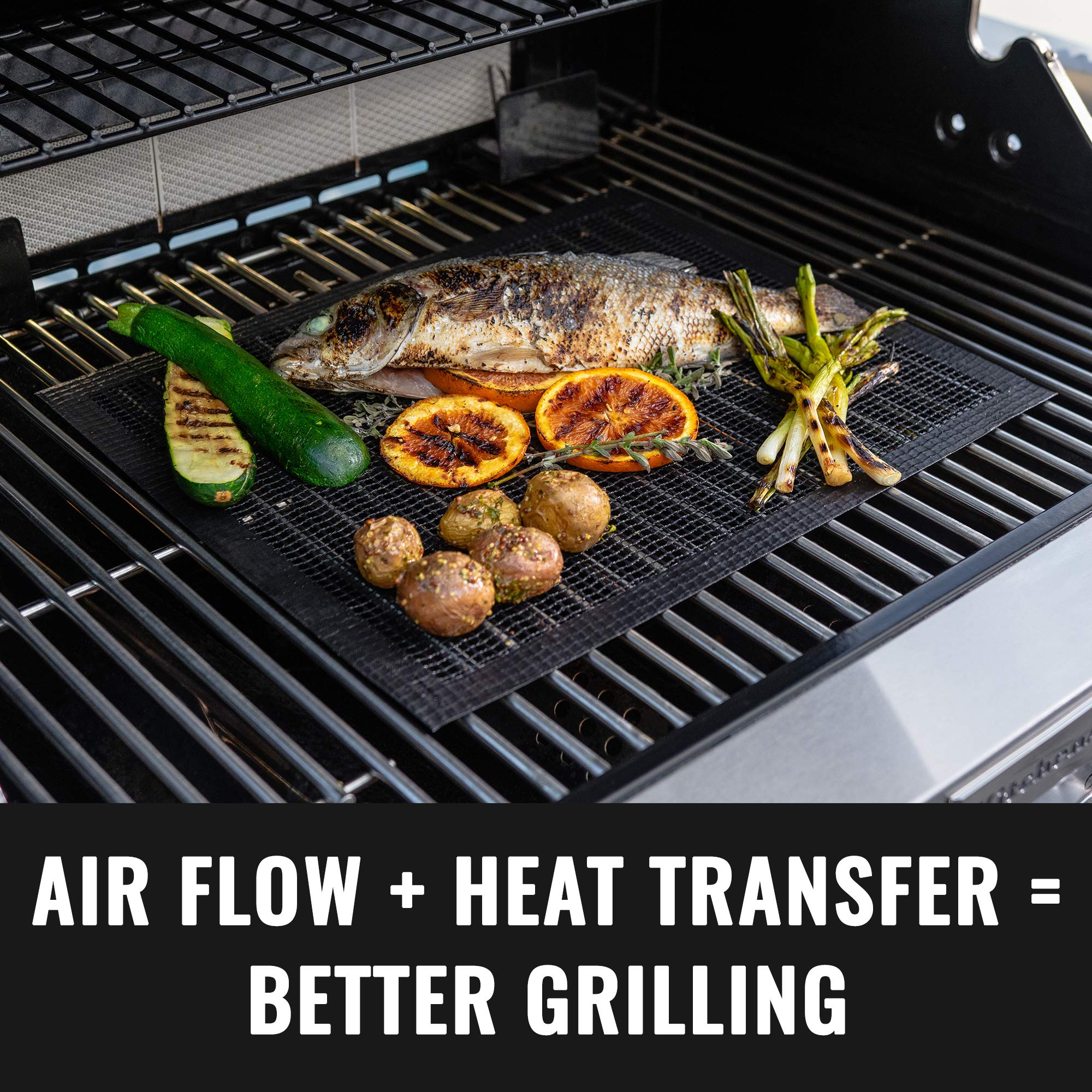 Grillaholics Grill Mats set on a countertop with grilling tools