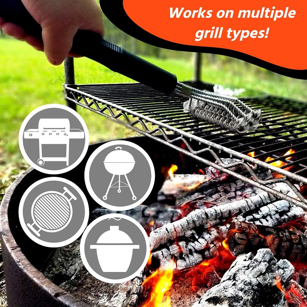 Grizzly Grilling Brush in use on a charcoal grill