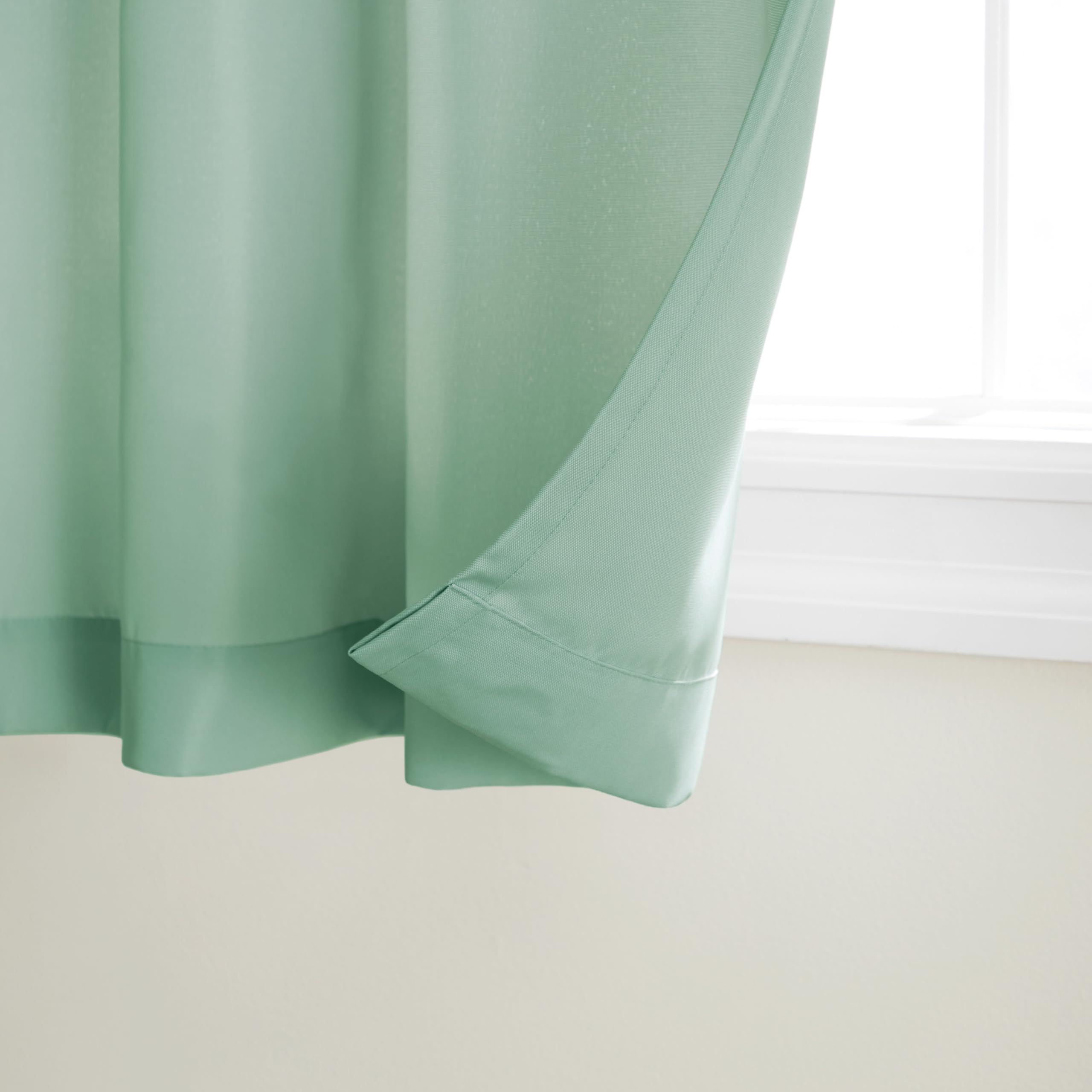 Grommet top detail of TOWN & COUNTRY BASICS Cabana Curtain Panels