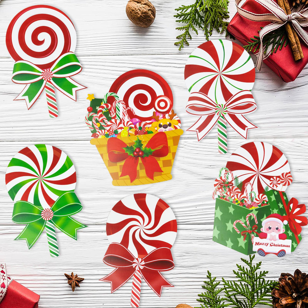 Group of GuassLee Candy Christmas Yard Signs with vibrant designs