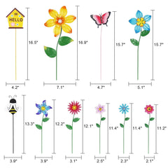 group of hogardeck decorative garden stakes in a flower bed