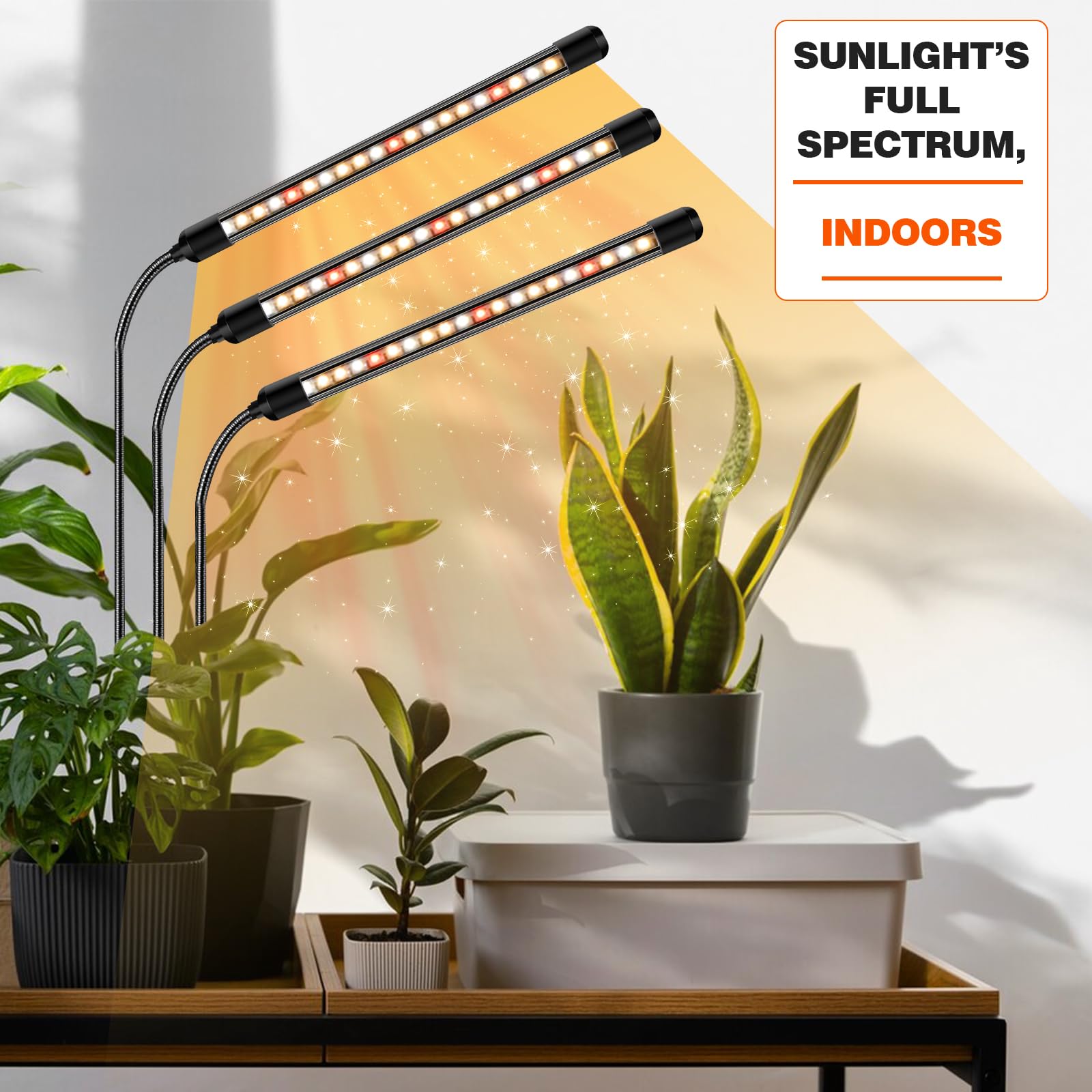 GROWSTAR Grow Light on a desk with potted plants