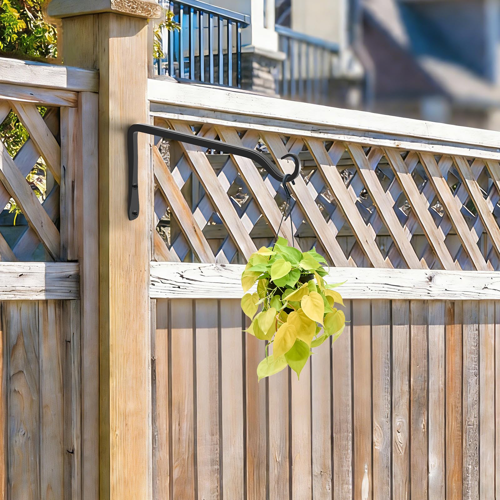 Gtongoko 8 Inch Heavy Duty Plant Hanger installed on a fence post