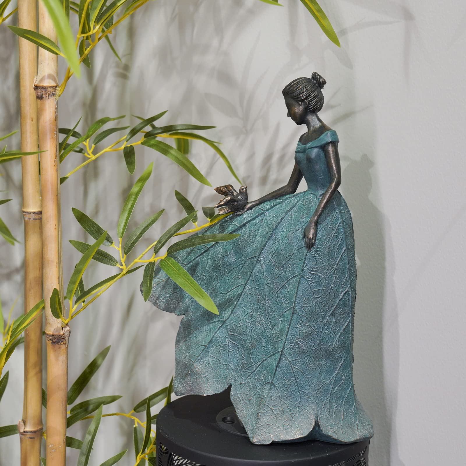 Guichifun Fairy Statue Leaf Angel Girl on a living room shelf