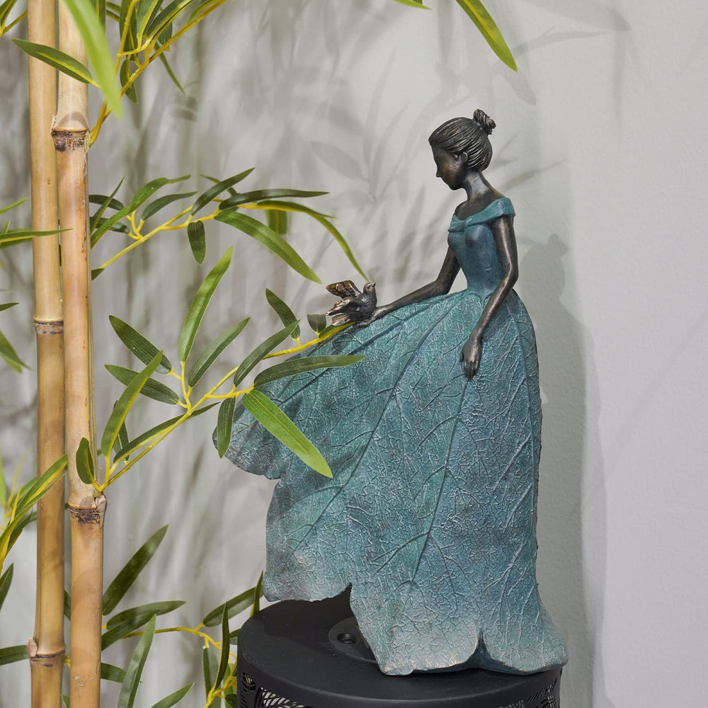 Guichifun Fairy Statue Leaf Angel Girl on a living room shelf