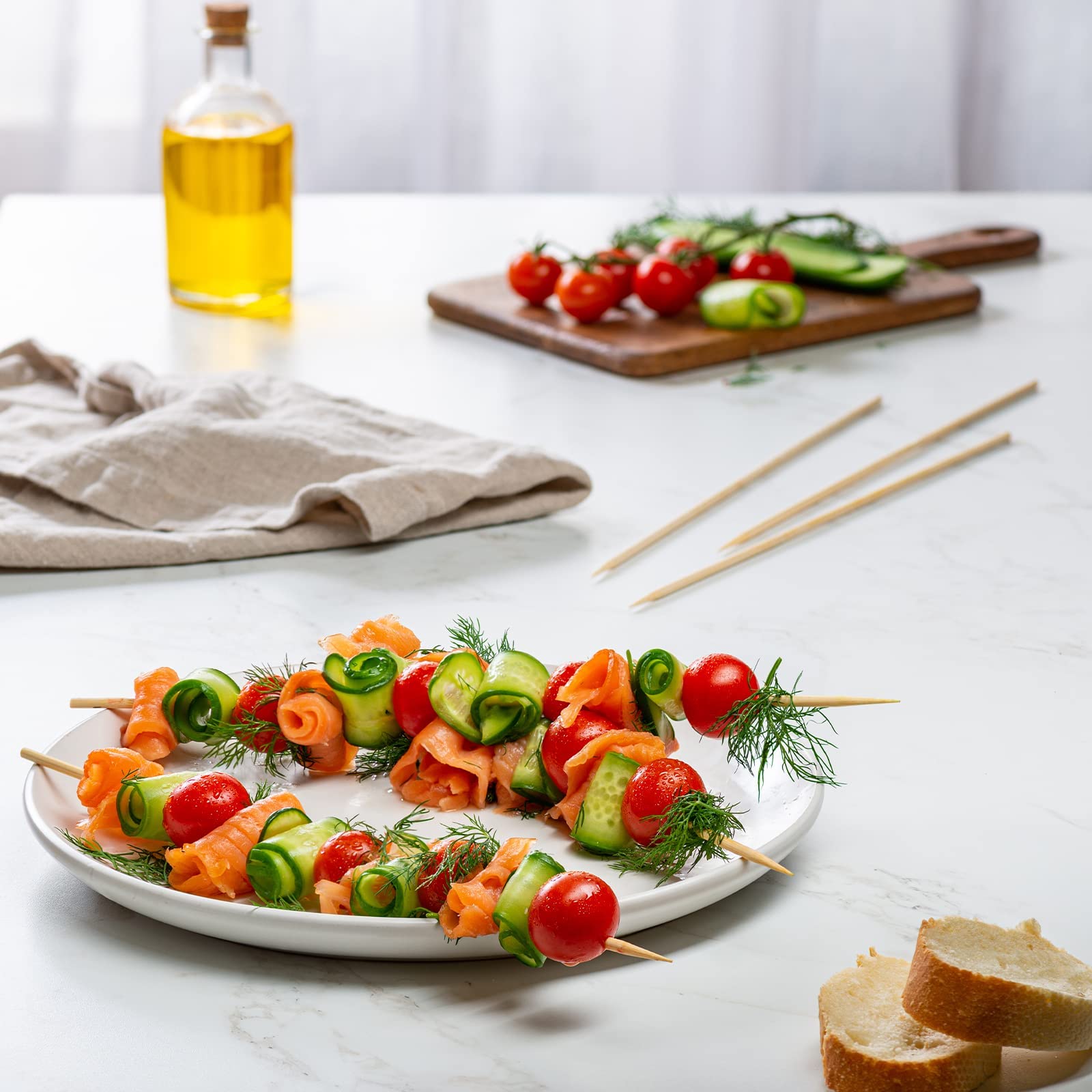 GUSTO bamboo skewers next to a BBQ grill