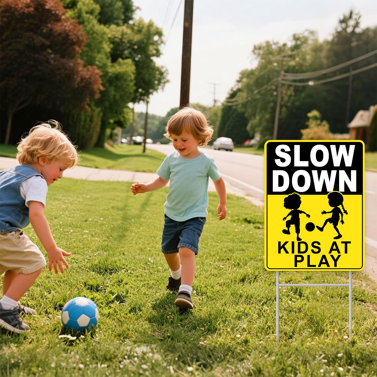 GXGGUS double-sided Slow Down Kids At Play sign outdoors