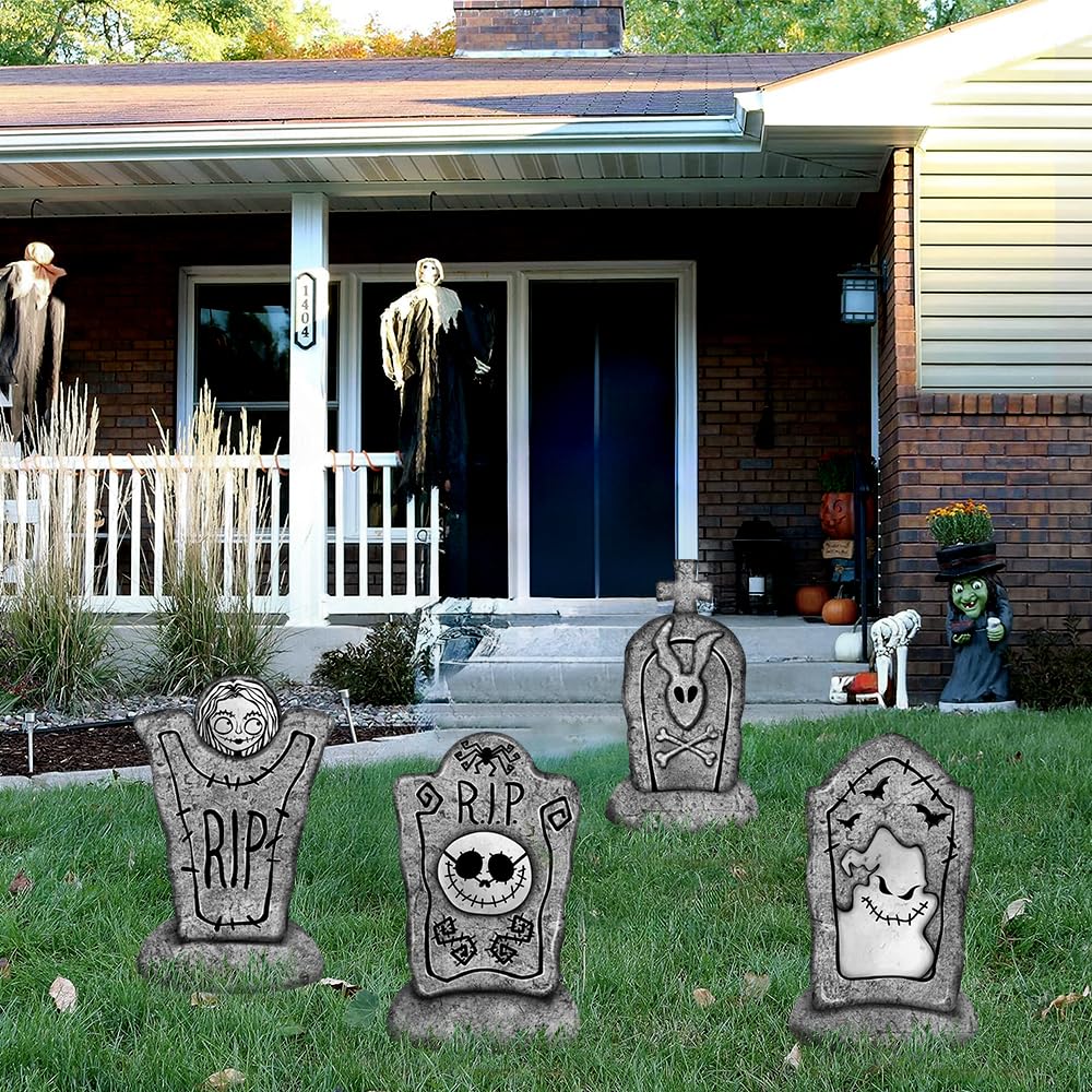 Halloween decoration tombstone setup with stakes in the ground