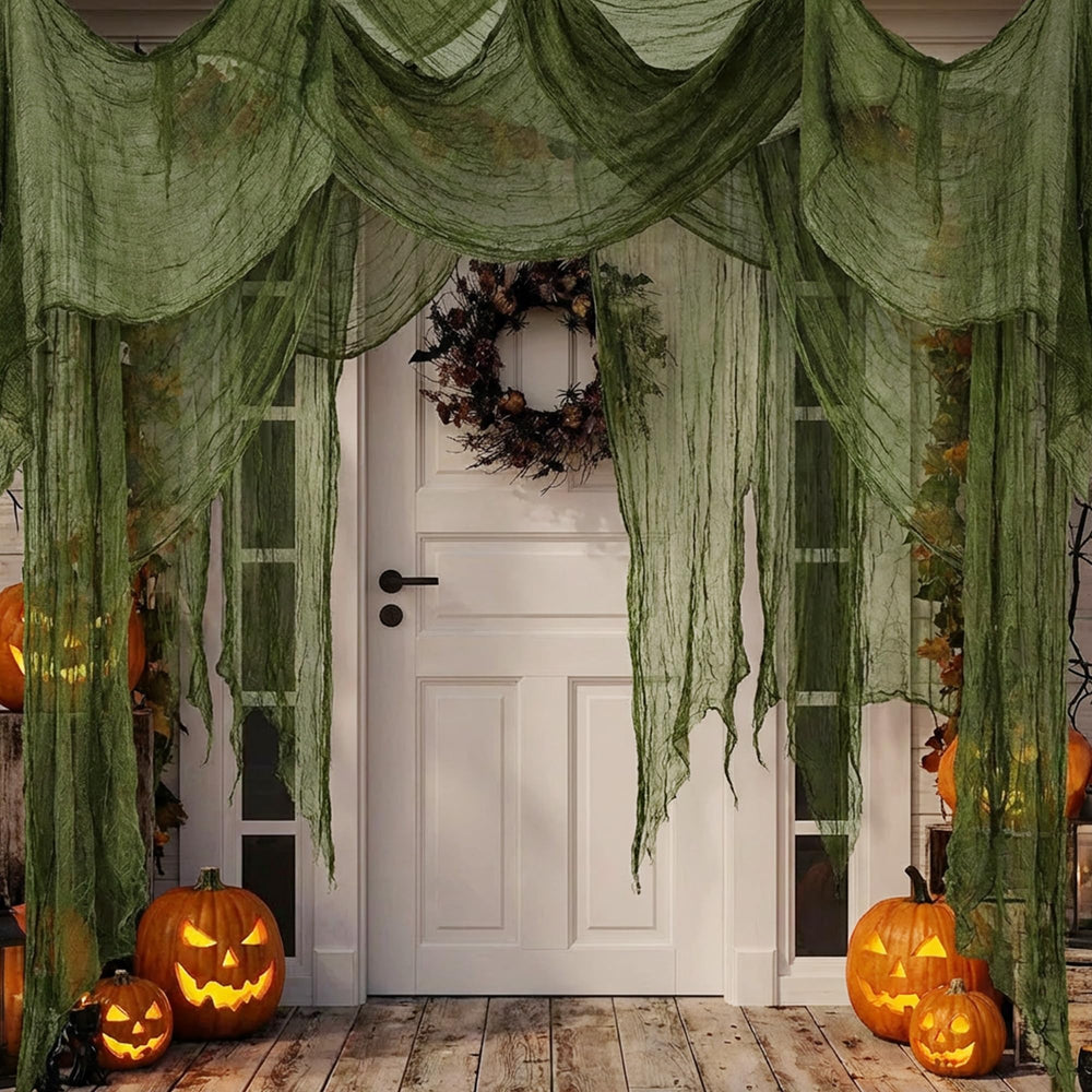 Halloween decorations featuring Watayo creepy cloth in a garden