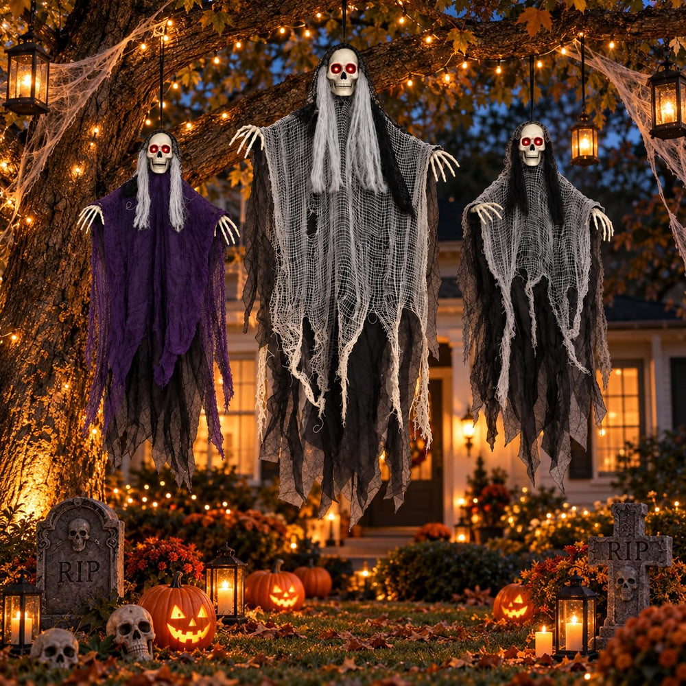 Halloween ghosts displayed on a tree for outdoor decor