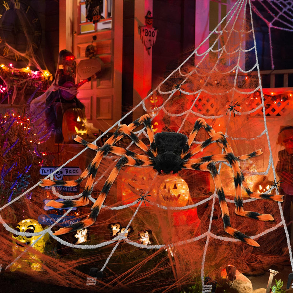 Halloween themed yard display with spider web