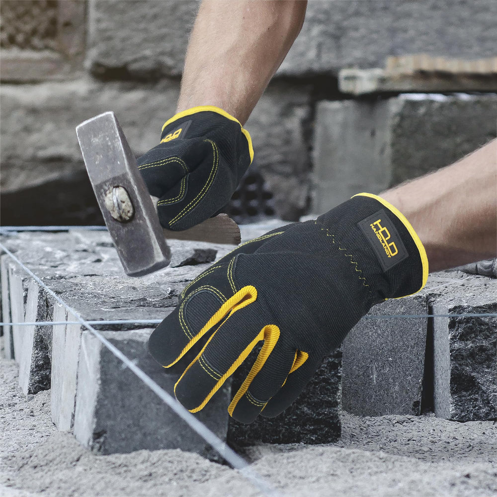 Hands wearing HANDLANDY Leather Gardening Gloves during yard work