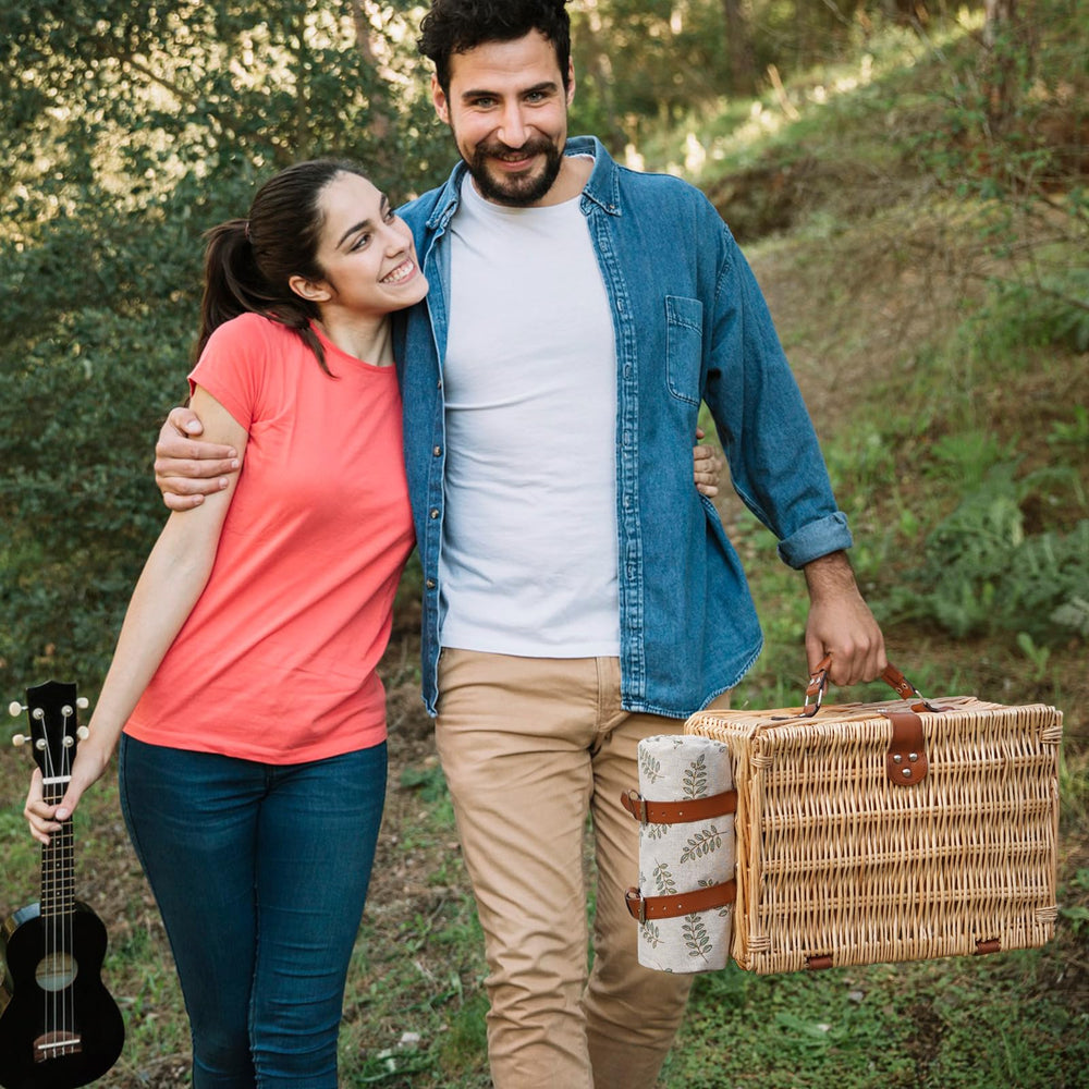 HappyPicnic picnic basket on a picnic blanket outdoors