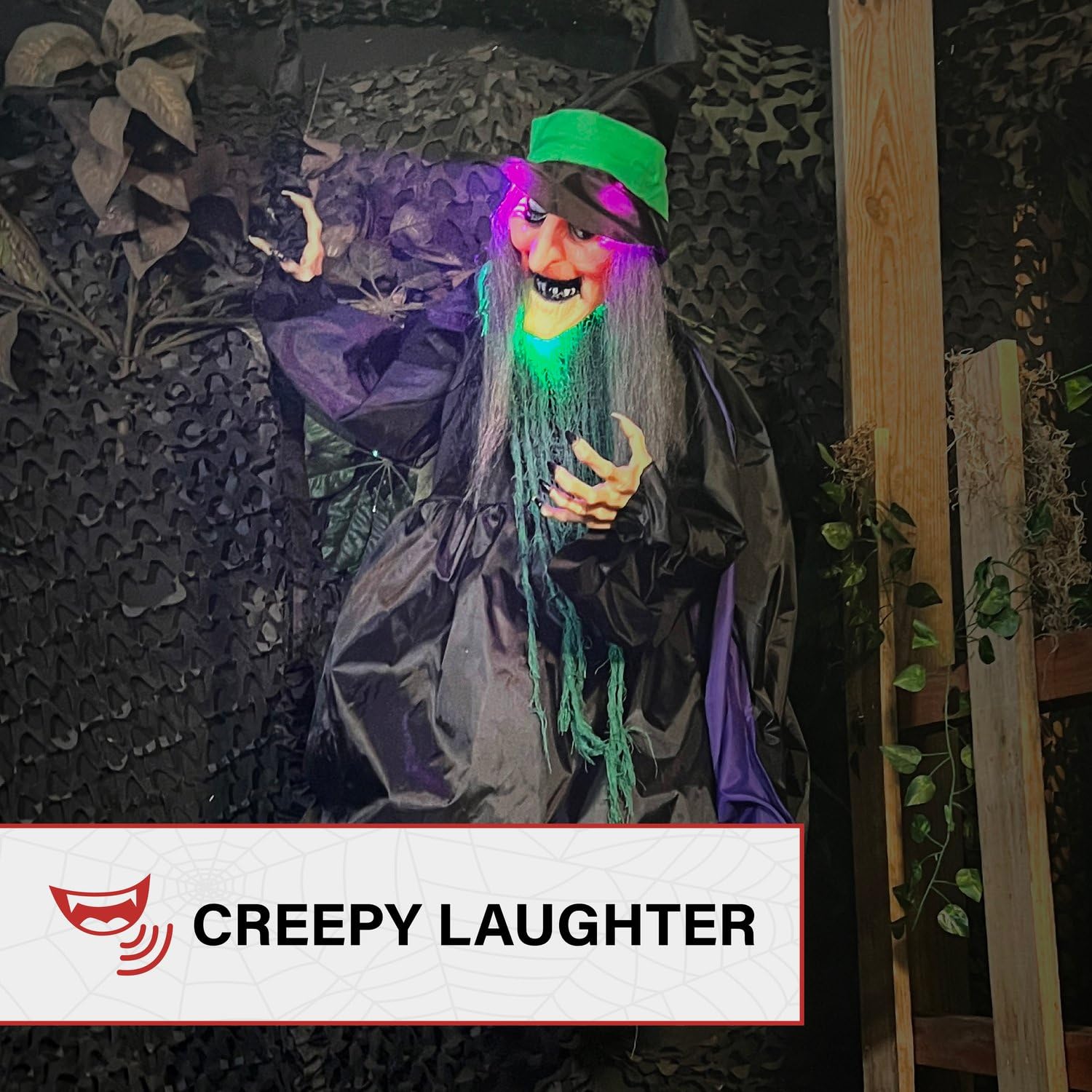 Haunted Hill Farm Flying Witch in a dark setting with eerie lights