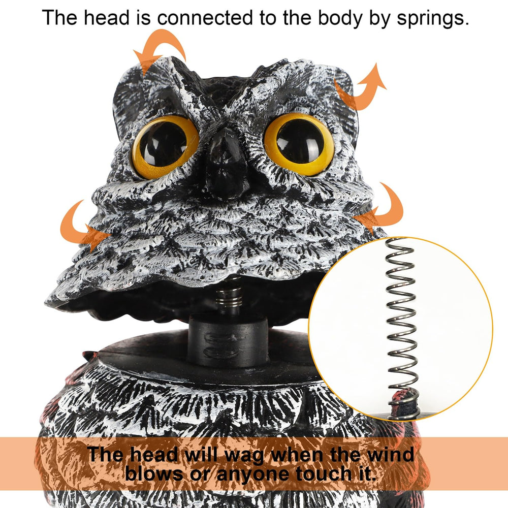 Hausse owl decoys placed in a garden setting