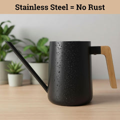 HB Design Co. Metal Watering Can filled with water