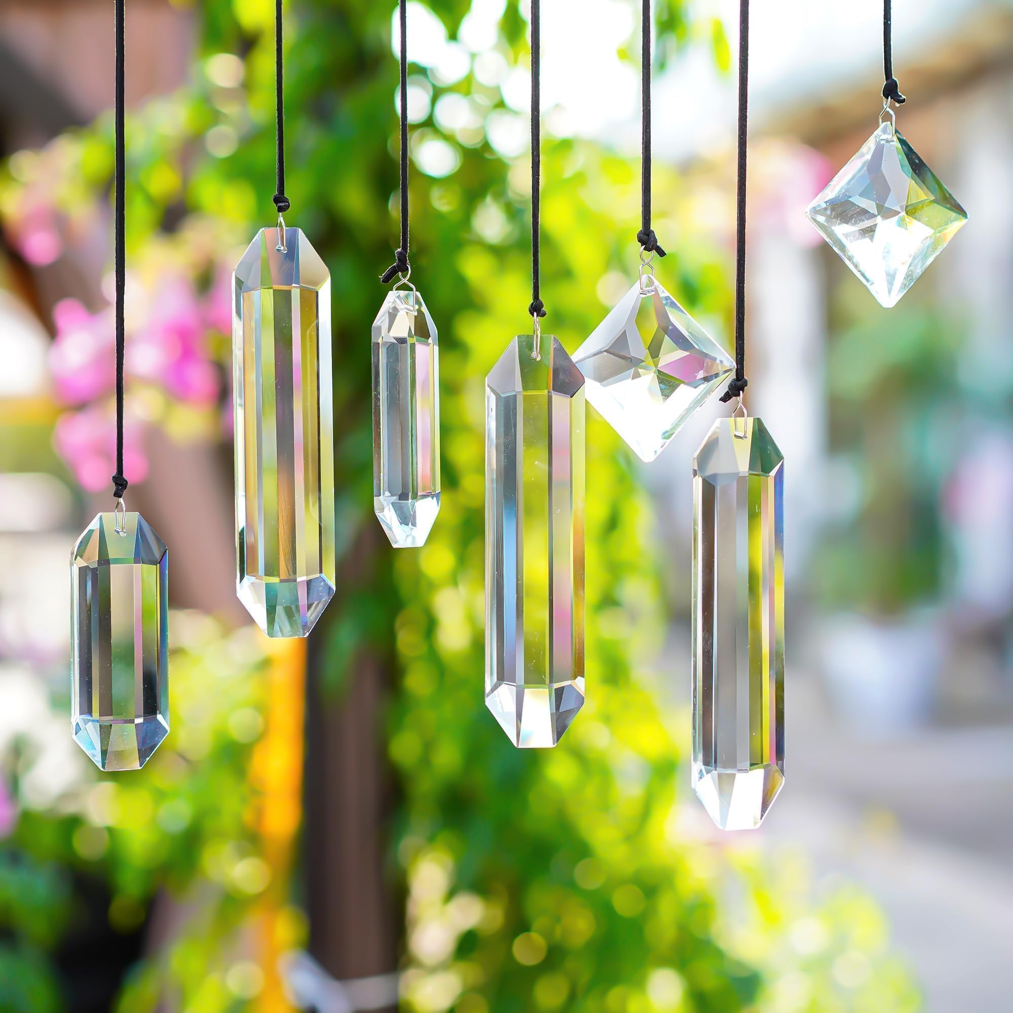 HDCRYSTALGIFTS Suncatchers displayed in a garden setting