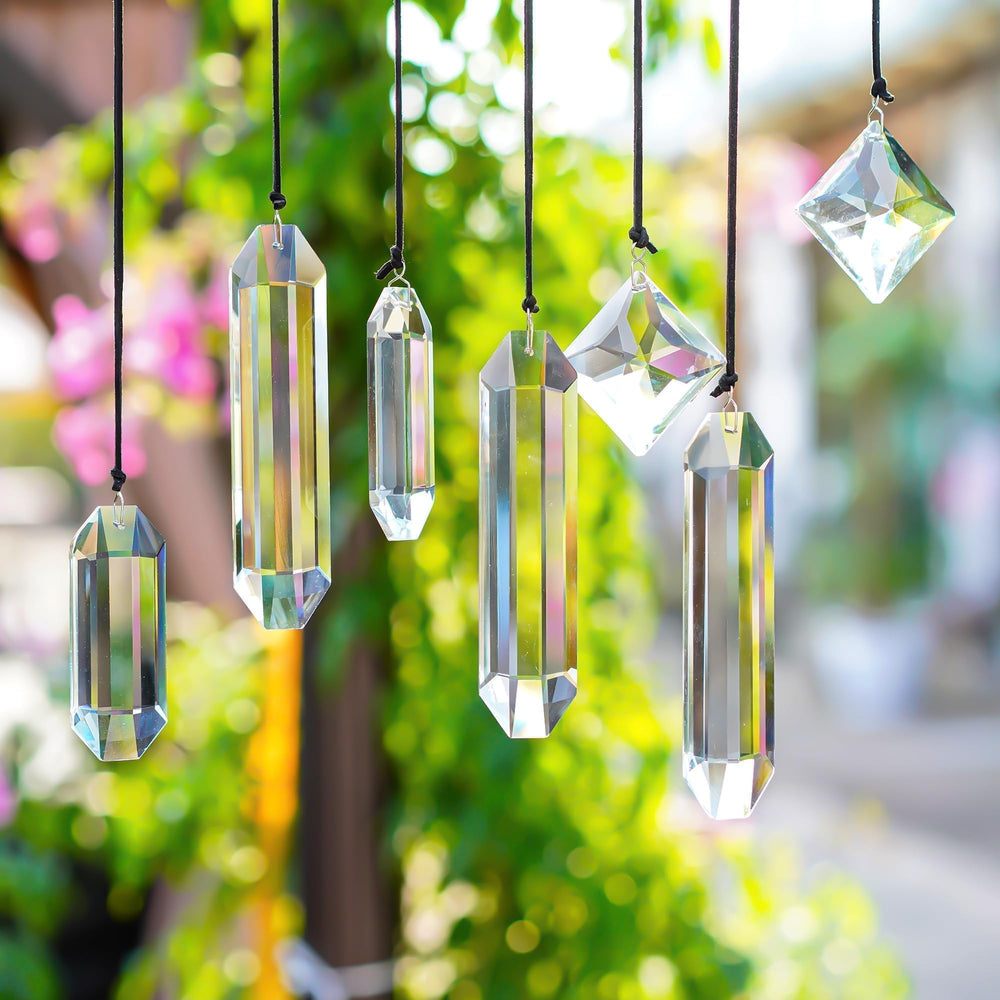 HDCRYSTALGIFTS Suncatchers displayed in a garden setting