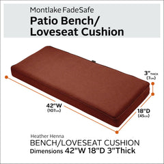 Heather Henna cushion on outdoor bench in garden setting