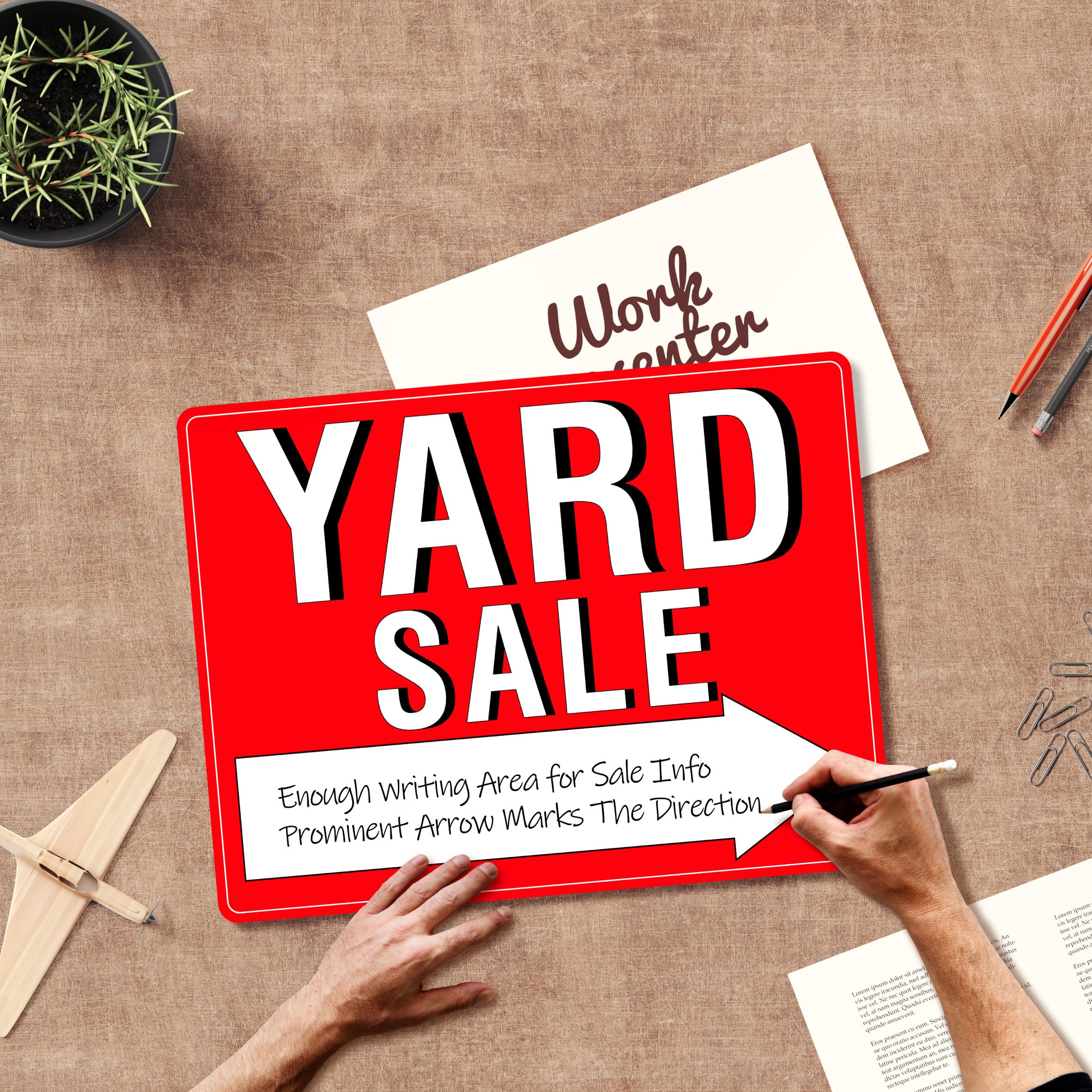 Hebayy yard sale sign installed in front yard