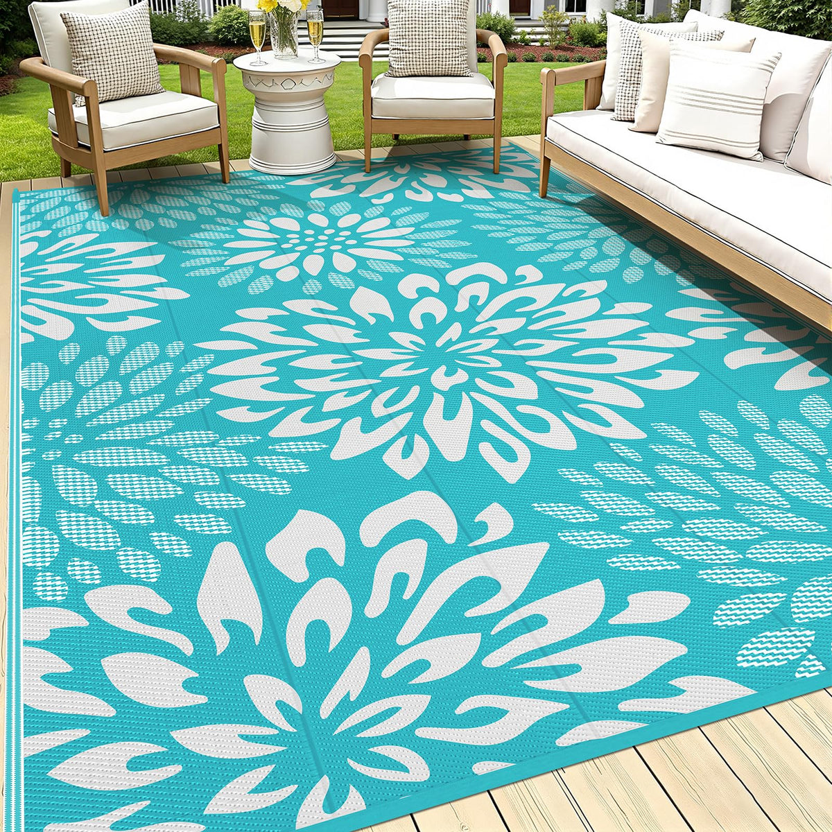 HEBE 9' x 12' floral reversible outdoor rug in teal